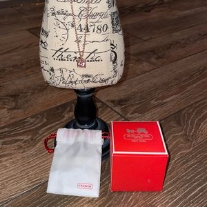 Authentic COACH, Rose Gold, open pink stone in bezel with box and pouch